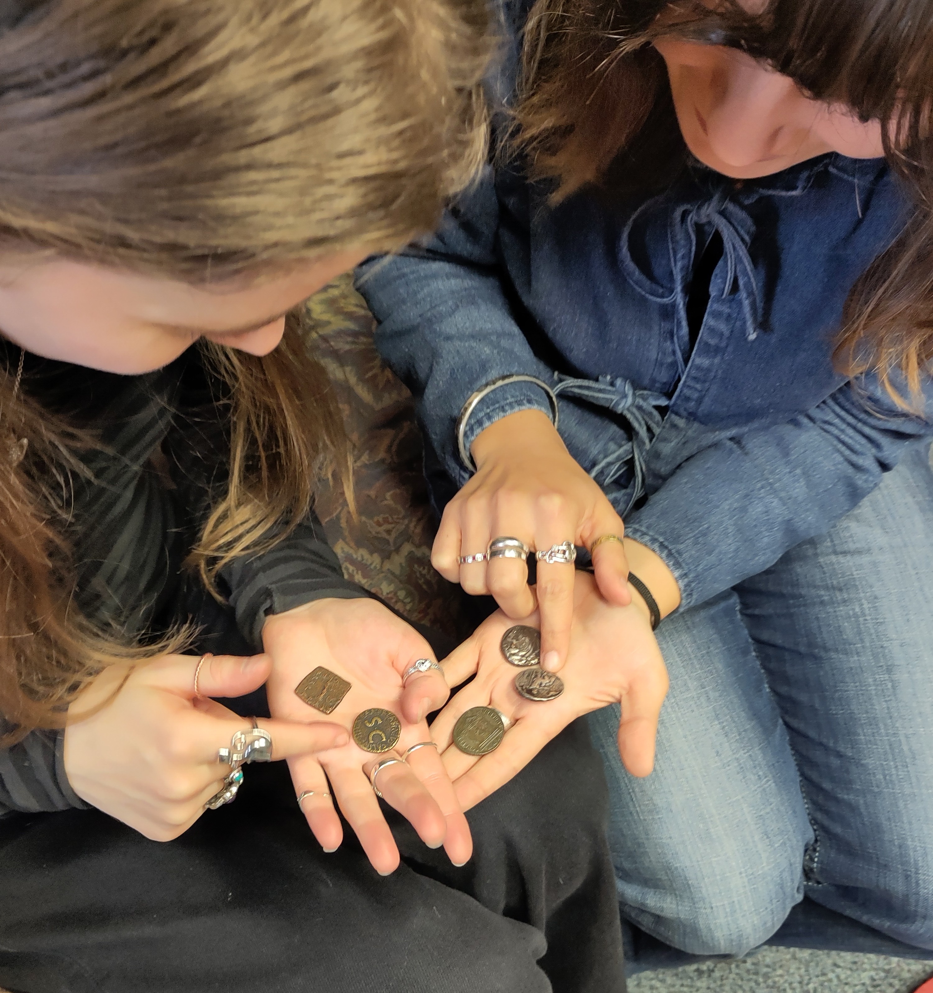 Two students with some coins